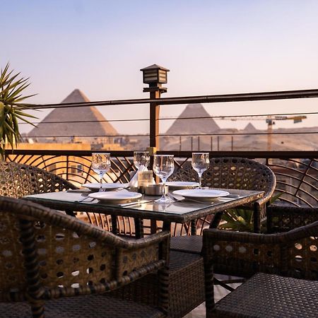 Pyramids Gem Plaza Hotel Kafret el-Gabal Exterior photo