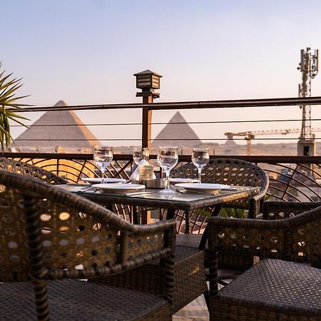 Pyramids Gem Plaza Hotel Kafret el-Gabal Exterior photo