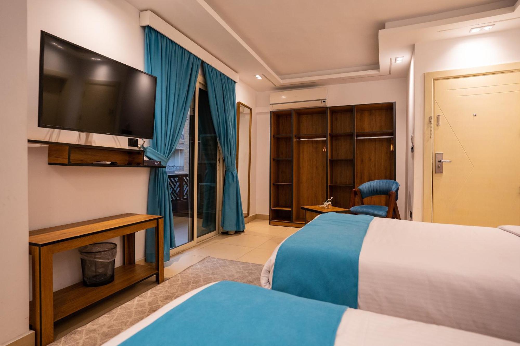 Pyramids Gem Plaza Hotel Kafret el-Gabal Exterior photo