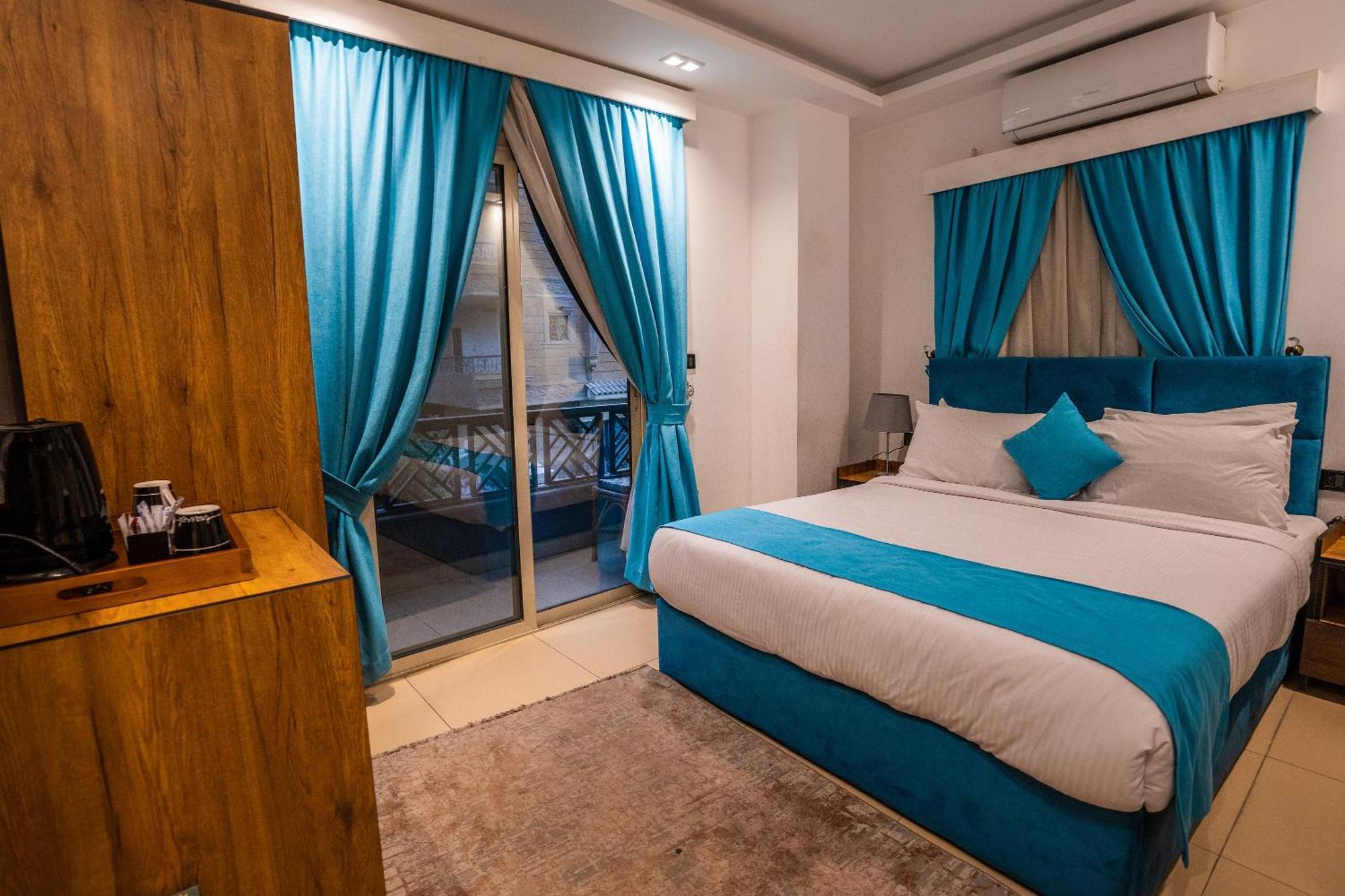 Pyramids Gem Plaza Hotel Kafret el-Gabal Exterior photo